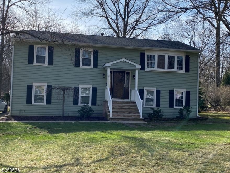 Lovely updated bilevel in Fawnridge neighborhood with public water, sewer and natural gas!  Level and open lot, 2 car garage, updated bath and powder room, hardwood floors throughout the main level, lower level features newer vinyl plank flooring, shiplap walls and updated interior doors.  French door from lower level to rear yard.  Roof redone in 2016.  Neighborhood mininal HOA fee for Fawnridge park, with playground, basketball and ice rink in winter.  Long Valley Schools and West Morris Central High School with IB Program.  Minutes to Rt. 80.