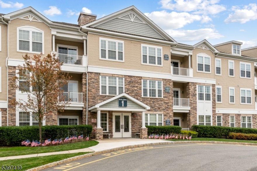 Welcome to Greenbriar at Fox Ridge, Rockaway Township?s premier active adult community. This beautifully updated condo is truly move-in ready, offering a warm and inviting atmosphere from the moment you enter. Step inside to find sun-filled rooms enhanced by elegant plantation shutters, gleaming hardwood floors, new carpeting, and freshly painted, neutral designer colors that create a calm and welcoming space. Thoughtful updates throughout, including modern light fixtures, add a touch of sophistication and make it easy to unpack your bags and feel right at home. Enjoy ample storage and a layout designed for both comfort and ease. Relax on your private balcony overlooking tranquil woods and a charming fountain, your own peaceful retreat, perfect for morning coffee or unwinding at day?s end. This condo is ready and waiting for its next owner to enjoy all that Greenbriar at Fox Ridge has to offer. The community features tennis and pickleball courts, year-round activities, and a vibrant social atmosphere that lets you enjoy the best of active adult living. Plus, you're conveniently close to shopping, restaurants, and NYC transportation, making everyday living effortless. Move right in and start enjoying the easy lifestyle you?ve been dreaming of.