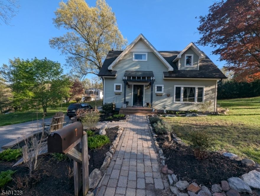 Beautiful Cape Cod home, completely renovated in 2004 and meticulously maintained, open floor plan, brand new carpeting and freshly painted. Beautiful kitchen and 2 stunning Baths, one on each floor. Two spacious bedrooms on the second floor, plus a den/bonus room on the first floor. Huge trex deck with privacy cove. Lots of storage capability in clean, unfinished basement with outside access. walking distance to Lake Neepaulin for fishing, kayaking and enjoying nature. Enjoy summer and winter outdoor fun at nearby ski slopes, golf courses, camping, hiking and horseback riding trails and Minor League Baseball at Skylands Stadium. **** BRAND NEW CARPET INSTALLED 12/11/2025, PLEASE REMOVE SHOES****