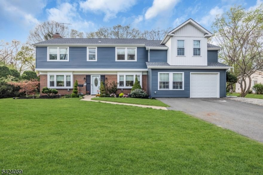 STUNNING fully renovated Colonial with 5 Bedrooms,3 full baths, + office/rec room. If curb appeal is your vibe, look no further! Custom crafted to enjoy modern updates in a desirable neighborhood. Fully updated kitchen with Quartz counters, breakfast bar, newer SS appliances, skylights, and adjoining oversized pantry.. Formal dining room being used as added living space leading to a 1st floor spacious bedroom. Brand-new full bath on the 1st level as you enter. Large family room with woodburning FP. Downstairs you will also find a laundry-utility room. Laminate and engineered hardwood throughout. Upstairs you will find the Primary Bedroom w/ tons of natural light, recessed lighting, and a fully upgraded Ensuite bath w/ double sinks, marble counters, linen closet.  You will also find 3 more bedrooms including a huge bedroom designed to give you ability to convert to addtl ensuite if you wish. Plus flex office-exercise room, and 2 linen closets.  Major updates include new custom addition, siding, timberline roof, gutters, (1) Lenox HVAC,new ductwork for 2nd floor in 2024. 2-zone HVAC. All windows and doors have been replaced. Serene backyard with over $75k+ in upgrades. Fully fenced with paver patio along with hot tub and shed. Prime location for commuters. Less than 10 min to Rutgers University, 2 major hospitals, beautiful parks and golf courses. Easy access to Rt 287/NJ Tpk/Rt 1. Rare opportunity to own a home where design and living space come together seamlessly!