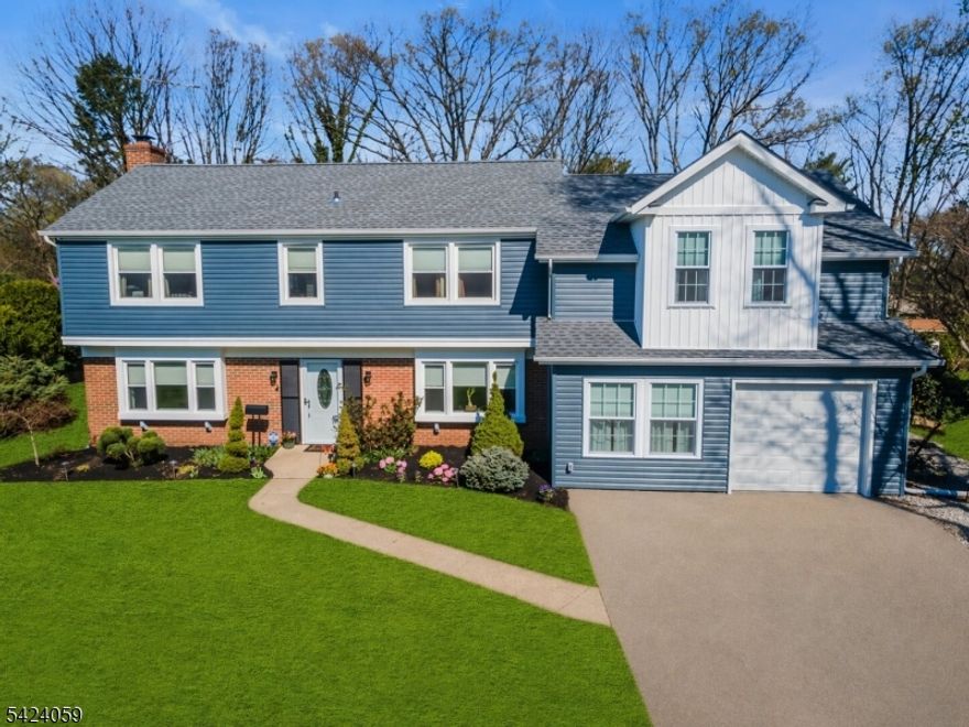 STUNNING fully renovated Colonial with 5 Bedrooms,3 full baths, + office including 1st floor bedroom! If curb appeal is your vibe, look no further! Custom crafted with modern updates in a desirable neighborhood. Fully updated kitchen with Quartz counters, breakfast bar, SS appliances, skylights, and adjoining oversized pantry.. Formal dining room being used as added living space leading to a 1st floor spacious bedroom. Brand-new full bath on the 1st level as you enter. Large family room with woodburning FP. Downstairs you will also find a laundry-utility room. Laminate and engineered hardwood throughout. Upstairs you will find the Primary Bedroom w/ tons of natural light, recessed lighting, and a fully upgraded Ensuite bath w/ double sinks, marble counters, linen closet.  You will also find 3 more bedrooms including an oversized bedroom designed to give you ability to convert to ensuite if you wish. Plus flex office-exercise room. Major updates include new custom addition, siding, timberline roof, gutters, (1) Lenox HVAC, new ductwork for 2nd floor in 2024. 2 zone HVAC. All windows and doors have been replaced. Serene backyard with over $75k+ in upgrades. Fully fenced with paver patio along with hot tub and shed. Prime location for commuters. Less than 10 min to Rutgers Univ, 2 major hospitals, beautiful parks and golf courses. Easy access to Rt 287/NJ Tpk/Rt 1. Rare opportunity to own a home where design and living space come together seamlessly! SPECIAL FINANCING INCENTIVE