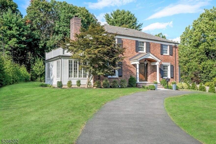 Stunning "new construction" classic colonial ideally situated on nearly a half acre of level property in one of the most coveted areas of Old Short Hills. Completely gut renovated to perfection in 2020 and expanded in all the right places, this chic and sophisticated dream home is as close to new construction as you will find in this prime bucolic location. Modern and fresh, this residence boasts a stunning open first floor plan with a wonderful flow, offering truly modern living at its best. The formal rooms are gracious and grand while the heart of the home is equally impressive, comprised of an extraordinary gourmet kitchen, inviting breakfast room with banquette seating and expansive family room with French doors to a bluestone patio. A private office, powder room and laundry center with room for two washers/dryers complete the first level. Upstairs, a luxurious primary bedroom suite boasts a large custom walk-in closet and spa-like bath with custom two sink vanity, large soaking tub and exquisitely designed walk-in shower, with three additional bedrooms and an impressive two-room hall bath. The lower level is a welcomed surprise offering high ceilings and a sizable rec room, powder room and oversized two-car garage. The rear property is a rare find in Short Hills: flat, expansive and private with all new specimen plantings. Just a 5-minute stroll to both the Short Hills train station and nationally top rated Glenwood elementary school.