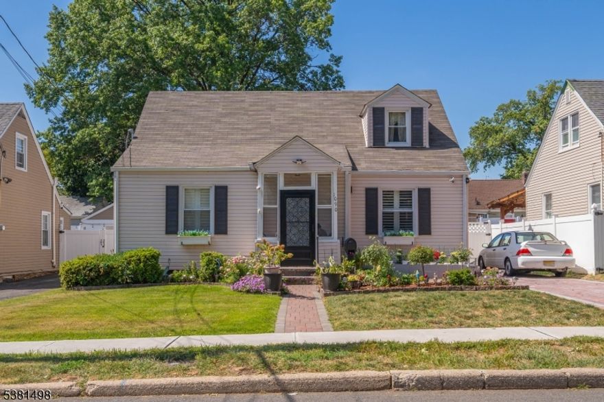 Welcome to this delightful Cape Cod home, perfectly maintained and ready for its next owner. The main level offers two comfortable bedrooms, a bright living room, a full bath, a well-appointed kitchen, and a versatile den. Upstairs, you'll find a spacious bedroom with a walk-in closet or the perfect space for a home office. The full finished basement expands your living options with a cozy family room, full bath, wet bar, and a convenient laundry/workshop area. Step outside to enjoy the gorgeous, fully fenced yard featuring a Florida room, a paver patio, lush greenery, and a beautifully landscaped garden ideal for relaxation or entertaining. Additional highlights include a one-car detached garage with a paver driveway, roof and gutters only 5 years old, and a water heater also just 5 years young. This home combines comfort, charm, and thoughtful updates truly move-in ready!