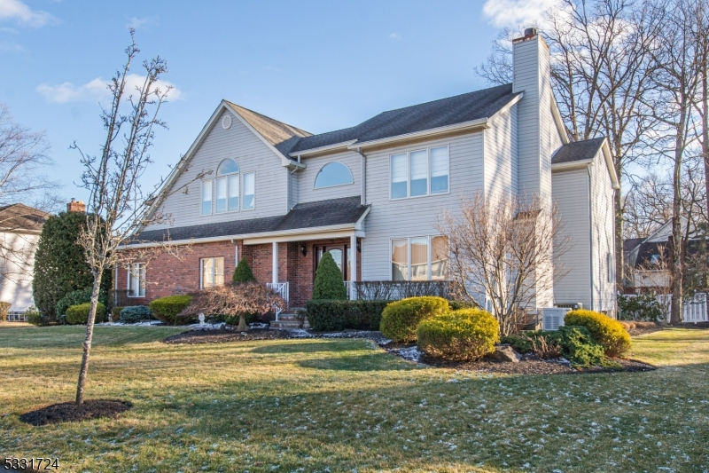 WELCOME HOME! Prepare to be wowed by this elegant center hall colonial located in a cul-de-sac within one of Wayne's best neighborhoods. Upon entering the two story foyer, you are greeted by classic custom decor. The recently updated powder rm on the left will excite you as you walk into your MASSIVE family rm with cathedral ceilings, skylights & a HUGE fireplace like no other with French doors leading to your oversized deck and level backyard. Off the family rm is a gourmet kitchen complete with peninsula, stainless steel appliances, double wall ovens, separate eating area and cathedral ceilings and skylights here as well! The large formal dining rm opens to your living rm with a second fireplace that will make any time special. Also on the first floor is a laundry rm and large coat closet .As you enter the second floor, you have an OPEN Hallway that looks out to your foyer on one side and to your family room on the other that will make you smile every morning. The second floor BOASTS two full baths and four bedrooms including a MASSIVE primary suite with two walk- in closets and bath with new quartz, jetted soaking tub that just says pamper me! The ground level offers a HUGE OPEN AREA great for a game room, gym, TV room with tons of storage areas and a half bath. This home also has a whole house back-up generator so you will never be left in the dark! Located just minutes to the Park & Ride to NYC. DON'T MISS THIS ONE!!