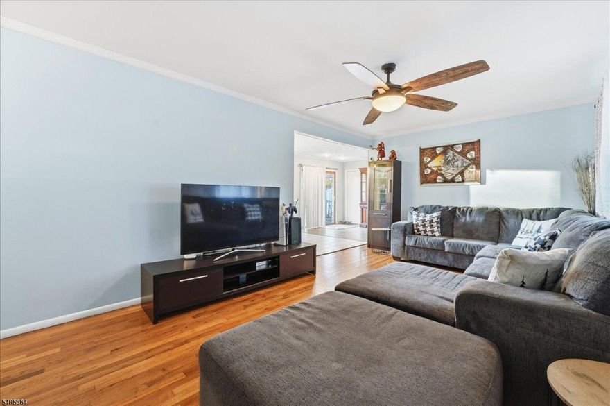 Experience the comfort of this well-cared-for 3-bedroom ranch, set on a generous corner lot. The outdoor space features a deck and fully fenced yard, perfect for unwinding or hosting guests. Inside, the home offers a practical and welcoming layout with a cozy living area, a dedicated dining room, and a full bathroom. The kitchen is conveniently paired with an adjoining laundry room. Ideally located near shopping, beaches, and major highways, this home blends everyday comfort with easy access to everything you need.