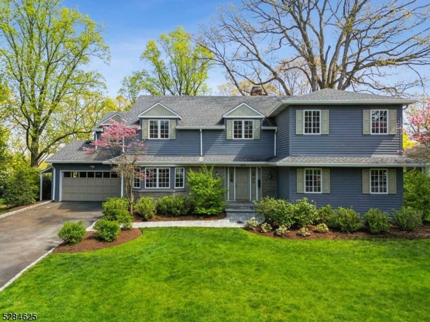 FULLY RENOVATED 6 BEDROOM COLONIAL* PRIME SHORT HILLS LOCATION * Welcome to 274 Forest Drive South, where classic details meet modern amenities. Walk up the bluestone pathway and step into a gracious foyer with elegant, sunlit staircase. The spacious formal living room features skylights and a wall of windows overlooking property. Across the foyer is the generous dining room with bay window and easy access to the gourmet kitchen. The heart of the home is the fabulous kitchen family room. The kitchen has a center island with bar seating, quartz counters, professional stainless steel appliances and is fully open to the family room with fireplace, bar area and large breakfast nook. A bedroom/in-law suite, powder room and 2-car garage round out the first floor.  Upstairs find four bedrooms and 2 full baths including a large scale primary suite with home office, walk-in closet and luxurious bath. 3 large family bedrooms share a renovated hall bath. The lower level offers so much added living space including a recreation room with kitchenette, bedroom with fully renovated bath, a craft room, gym, laundry room and tons of storage.  Step outside to the gorgeous deck and park-like yard with specimen plantings and wide open lawns, perfect for outdoor relaxation and play. Walking distance to the Short Hills train station, Hartshorn Arboretum, Glenwood Elementary and all that Short Hills has to offer, 274 Forest Drive South is a wonderful property in an A+ location.  Welcome home!