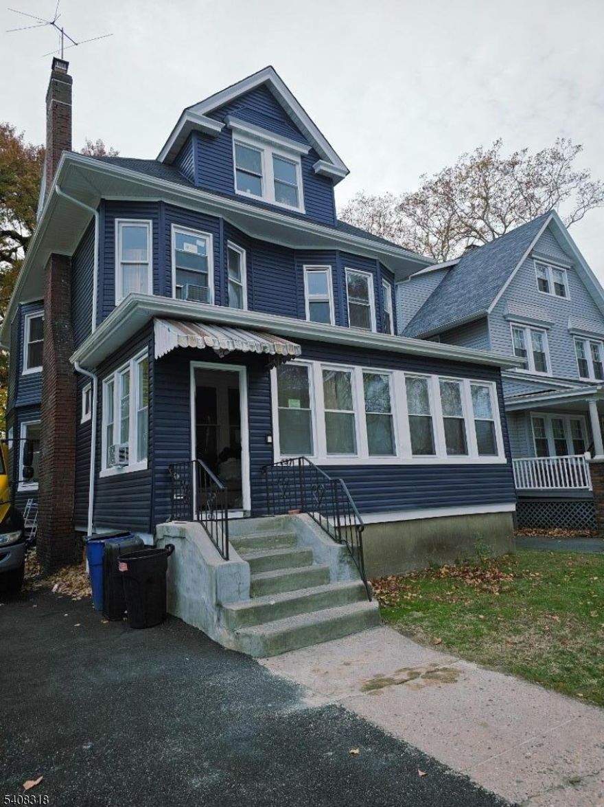 Instant Cash Flow Awaits You! This spacious 5-Bedroom Victorian-Colonial in East Orange, NJ is a true cash-cow opportunity offering income potential from day one   or a perfect home for buyers seeking space, character, and long-term value. Featuring a generous layout with an eat-in kitchen, formal dining room, living room, enclosed front porch, finished basement, and 4 full baths, this home delivers both size and versatility. A large private driveway provides ample off-street parking, a rare find in the area. Currently occupied with tenants, creating strong income potential. **Property is being sold AS-IS. Buyer is to perform all due diligence. Buyer is responsible for all town inspections and certs.** Whether you're looking for steady cash flow, a property with long-term upside, or a buyer ready to make this spacious home your own, this property offers endless possibilities.  This 5-Bedroom Victorian-Colonial is a cash cow so churn it up, because you're about to make C.R.E.A.M.