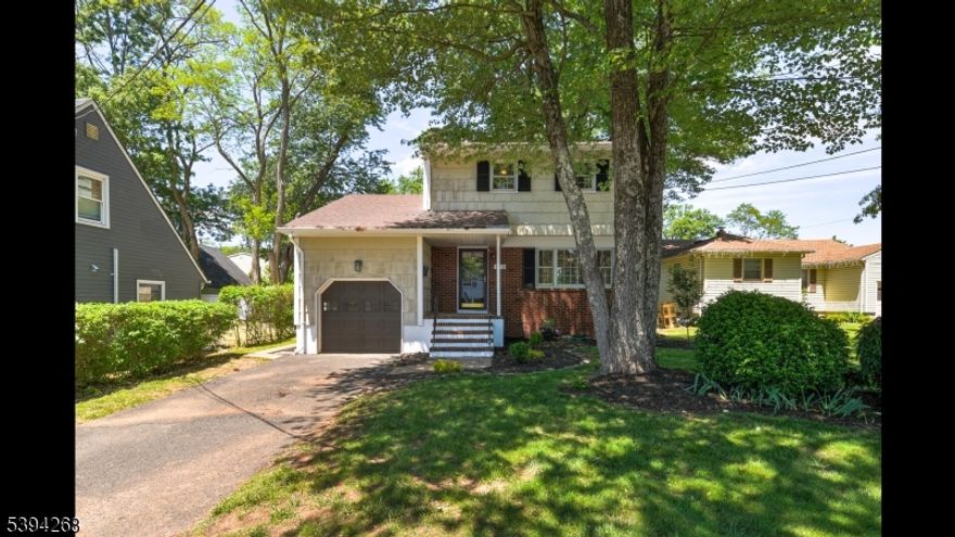 Charmng updated colonial in the heart of Greenbrook.  Welcome to this beautifully updated colonial located in the sought-after Watchung Hills School District. 3 spacious bedrooms, 1.5 fully updated baths.  Brand new kitchen with all new stainless stelel appliances, soft close cabinets, and granite countertops.  Hardwood floors and luxury tile throughout the home.  New roof (2025), Newer hot water heater and HVAC system (2021) Private backyard with patio. Attached 1 car garage into bonus room/office. Conveniently located to all major highways, public transit and shopping.