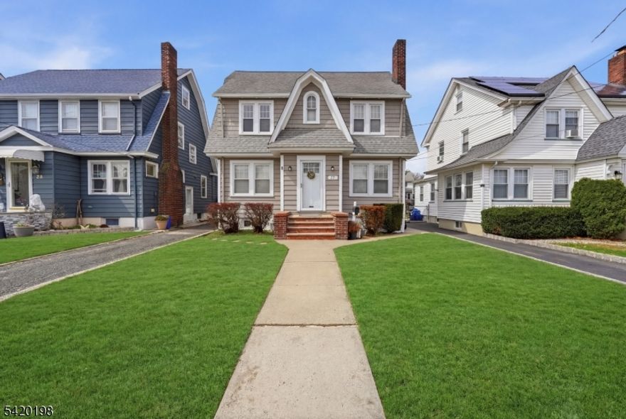 Simply put, a terrific Colonial on one of the finest streets in town. Desirable location is the perfect setting for this great home. Enter through your bonus vestibule and you will immediately appreciate the hardwood floors and the wood burning fireplace. There are lovely French doors leading into the formal Dining Room. All the rooms are spacious throughout. There is ample cabinets in the updated kitchen, and right off the kitchen is a bonus room; use it as a large room, office, or convert to laundry or bath. Off the bonus room ( it was the dogs bedroom:) is door to deck and good size fenced yard. . All the bedrooms are good size and the fourth bedroom is located on the 3rd level, yes, it is heated.  The basement is semi finished and has a full bath! New upgraded electric panel. Hot water heater is approx 6 years old. Furnace is routinely serviced. Great home!