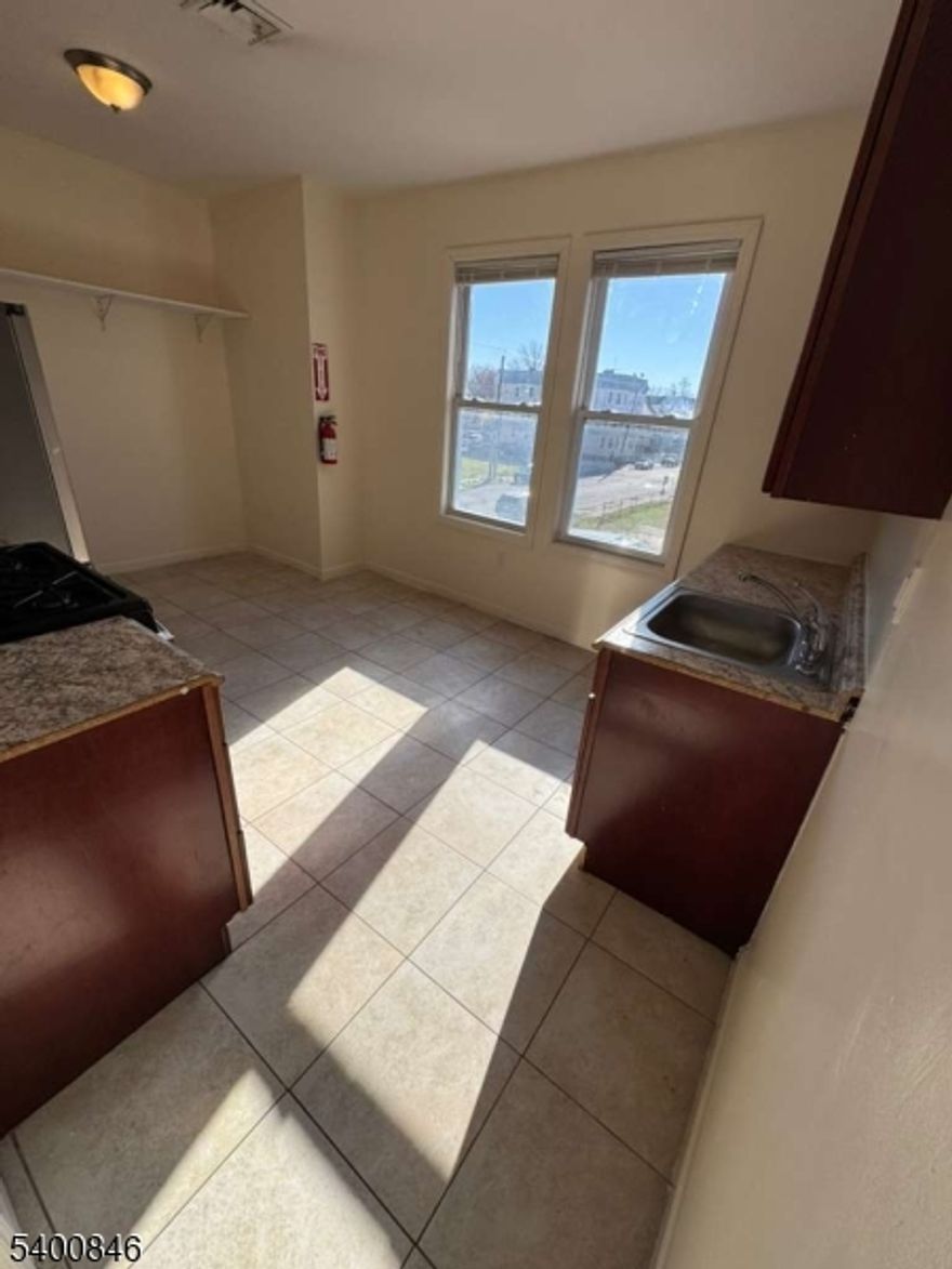 Welcome home to 209 21st Street, Unit #2 in Irvington NJ now available for immediate move-in at $2,600 per month. This spacious second-floor apartnent features 4 bedrooms and 1 bathroom and was thoughtfully renovated in 2020 to offer modern comfort and functionality. Wood flooring flows throughout the unit, creating a warm and inviting atmosphere while enhancing the generous layout and room sizes. The apartment also includes the convenience of washer and dryer access in the basement and is ideally located near public transportation, major roadways, and local amenities making this move-in-ready home the perfect place to settle in and start your next chapter.