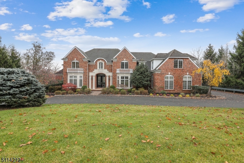 Fantastic custom colonial in a private location set on 1.15 acres. This home boasts of 6 bedrooms, 6 full baths and 2 half baths, approximately 8700 square feet. Located in the prestigious Summit Woods section. It has a designer kitchen with custom cherry cabinets, 8 burner Viking stove and wall ovens, sub zero refrigerator, and a open breakfast area. The two story family room has a fireplace. Butlers pantry. Family has french doors to Deck.  The master bedroom 1st floor, luxurious bath with steam shower and whirlpool soaking tub. all bedrooms have en suite baths. 2nd master bedroom and 4 other bedrooms on 2nd floor. The finished lower level has a bedroom with a full bath, wet bar, a full recreation room with French door access to the patio.  Back to woods and fabulous far view of rubbling Passic river.  3 car garage. A marvelous find! Must See!! fireplace and chimeny condition as is for no known issues.