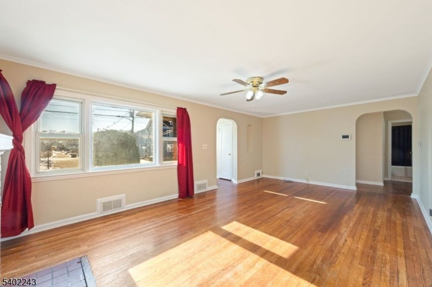 Welcome to this spacious and well-maintained 4-bedroom, 2 full bathroom single-family home. This inviting residence offers a comfortable blend of charm and functionality, featuring hardwood floors, carpeting, and freshly painted interiors throughout. The home includes all appliances and newer washer and dryer for added convenience, along with a 2-car deep garage and a 1-car width driveway + a finished basement, providing ample parking and storage options. Enjoy outdoor living with a private backyard and deck, perfect for relaxing or entertaining.One bed, desk, and 4 tables are included ideal for tenants seeking a partially furnished option. Conveniently located near major highways, shopping, dining, and public transportation. Vacant, professionally cleaned & ready for it's new tenants.