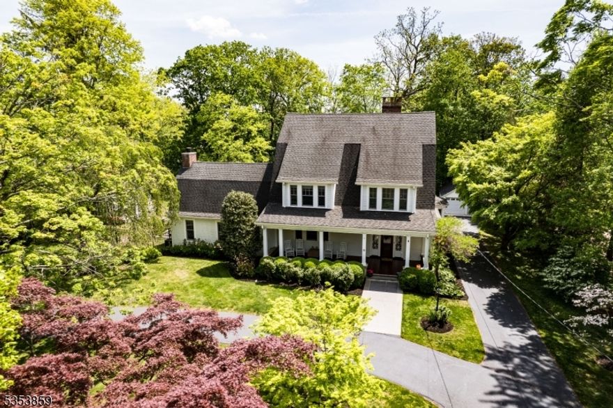 Vintage 1908 Colonial completely renovated for today's lifestyle while maintaining the grace of yesteryear.  High Ceilings beautiful moldings and hardwood floors throughout with oversized windows. Country setting yet just a few blocks  to town, train and schools. This 6 bedroom 3 1/2 bath  Dutch Colonial has 4 levels of living space on over an acre of property with mature beautiful trees and professional landscaping.  An new inground gunite heated pool with hot tub was added in 2020 by the current owner.  Also a greenhouse was added and a large 3 season porch with floor to ceiling fireplace.  There are wood burning fireplaces in the family room and 3 season porch and a gas fireplace in the kitchen.