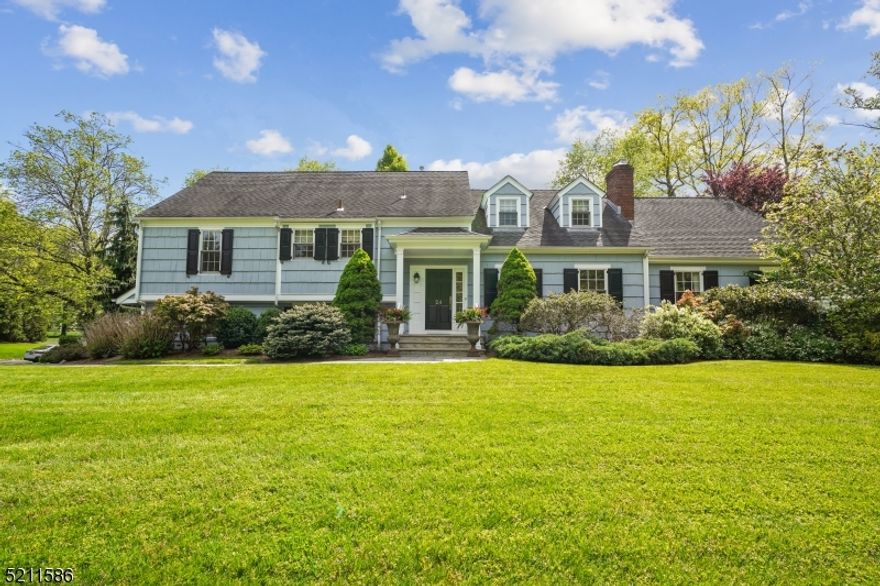 Sun-filled and move-in ready, this renovated and expanded home blends modern finishes, traditional design, and an enviable circular layout for easy hosting and everyday living. Formal reception spaces, like the living room with its honed black granite fireplace and dining room with built-in bar, flow seamlessly into a built-in clad fireside family room and custom eat-in kitchen where sliding glass doors open to the private patio and backyard. Upstairs five bedrooms include an expansive third-floor primary suite with two custom walk-in closets and a luxe marble accented bath, complemented by walk-up attic storage with endless potential. Downstairs offers great flex space with a second family room (this one with a separate entry and convenient built-in mud area), recreation room, laundry room/half bath, access to the two-car garage, and additional untapped storage space. Recessed lighting, gleaming hardwood floors, Ethernet wiring, lush landscaping, underground sprinklers, a fenced-in backyard, and more add to the appeal. Best of all is a location near Gero Park (swim, golf, and tennis), world-class dining, shopping, top-rated schools, and mid-town direct transportation. All chimneys, flues, and fireplaces are to be conveyed strictly in, "as-is" condition. There are no known issues.  The window treatments are also conveyed in, "as is" condition.