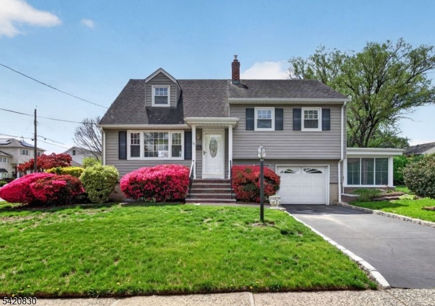 Welcome to this charming split-level home, perfectly positioned on a corner lot in the highly sought-after Patricia Place neighborhood of Clifton, New Jersey. This well-maintained home features 3 bedrooms 1.5 bathrooms, a sun-filled living room with a large picture window, dining room, and a functional kitchen. The finished basement provides versatile additional living space, complemented by an attached garage, enclosed porch, central air conditioning, and a beautiful side yard ideal for relaxing or entertaining. Conveniently located near public transportation, houses of worship, shopping, and parks, this home offers both comfort and accessibility. Come make this lovely house, your home!