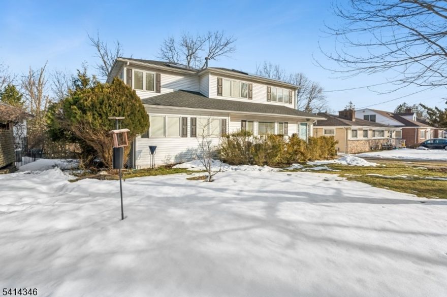 Welcome to this deceivingly large custom home in the heart of Pleasantdale. Tucked away on a dead-end street, this home boasts a mix of traditional & modern updates. Wide plank oak floors, large rooms & generous closets are found on all three finished levels. The spectacular kitchen, designed by Mary Douglas Drysdale, isn't only stunning but also a chef's dream; adorned with top-of-the-line appliances and surrounded by loads of cabinets & generous Caesarstone quartz countertops affording great prep & buffet space. The first floor has a wonderful flow for relaxing and entertaining guests. With six bedrooms, the primary bedroom en-suite is on the first floor, plus four bedrooms upstairs and an additional bedroom in the basement. This home has a working elevator and is accessible to people with disabilities, accommodating all lifestyles. Other highlights include a new roof (2024) and a new CAC (2023). Walk to nearby Houses of Worship and schools; steps from a FREE jitney/shuttle bus to NJ Transit trains to NYC; easy access to major highways and parks & recreation.