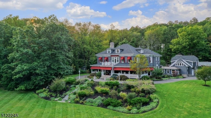 LUXURY-PRIVACY-LOCATION IN CLOSE PROXIMITY TO ALL are paramount to this one-of-a-kind staycation residence with it's spectacular Main House, Renovated separate Carriage House, newly constructed 3-car heated garage w/ a fabulous Loft Apt above all situated on over 3 acres of stunning property. Renovated to the highest standards throughout, this property offers versatile flex living space for day-to-day open concept living, elegant entertaining spaces, tucked away options for multiple home offices, virtual learning, & guest quarters for extended visits w/ample pkg areas.  This home ticks all the boxes!  Enter from the wonderful wrap-around 'lemonade' porch to a grand Foyer where your journey begins.  A high-end custom kitchen opens to the large family room overlooking courtyard property.  The LUXE Master Suite w/marble bath offers access to a secluded deck w/views of exceptional sweeping lawns.  Steeped with history, this home once known as Villa Elsinore, adds a pedigree to this circa 1901 estate.  A series of updates & renovations by the current owners blended beautiful, period details w/modern amenities for today's lifestyle. A rare opportunity to enjoy your own country compound just 4 miles to Summit's Train Station & minutes to major highways, local airports & more.