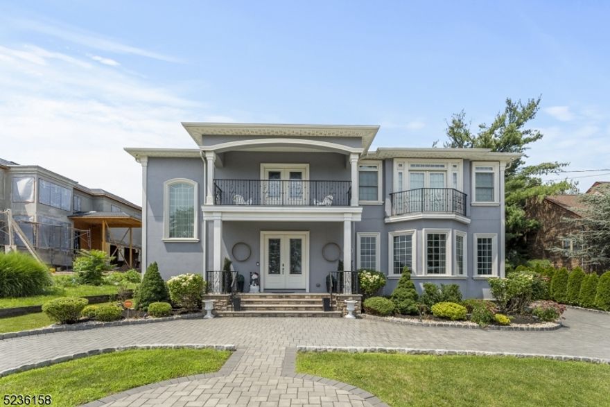 Here is your Opportunity to Live on Millionaire's Block in Clifton w/NYC views. Be the Second Owner of this Magnificent 8,000 SF Home that Boasts 7 beds,7 baths.The first floor is an Entertainer's Dream with the Open Floor Plan and Fireplace.There is a Formal Living Room,Dining Room,Family Room,Kitchen w/Center Island and Breakfast Bar,Top End Appliances include Wolf and Sub-Zero refrigerator and Maid Quarters.The Second Floor has a total of 4 bedrooms,3 full baths, Laundry Room and a Master Suite w/Balcony Facing East and has a sitting area,its own office,two WIC and a spa like bathroom complete with 2 water closets. Fin.Basement  has 8' ceilings and plenty of light which adds to the entertainment area with Bar,Billiards Area,Bathroom and 2 Bedrooms plus Office.The Rear Yard has a Large Gazebo and an Outside Kitchen Area complete with Wolf & Sub-Zero Appliances, and BBQ Bar Seating.One of the Sheds has a kitchenette & half bath,ready to be used as a pool cabana.15 Miles from NYC