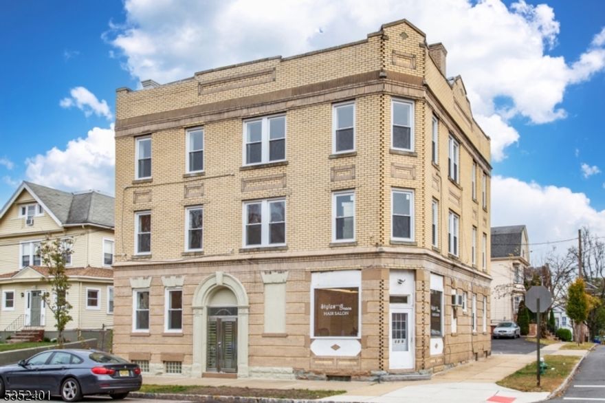 Don't miss this rare investment opportunity in the heart of Montclair! Fully renovated in 2024, this turnkey 7-unit mixed-use property on Maple Ave features 6 residential apartments and 1 commercial unit, currently leased to a well-established hair salon. The residential mix includes five spacious 2-bedroom units and one studio, each with its own designated parking space in a brand new, exclusive blacktop lot. The building has been completely overhauled with all-new electrical and plumbing systems, brand-new tankless water heaters for every unit, a new roof, and a renovated common area. Four of the six apartments feature brand new HVAC systems. The basement includes dedicated storage for each unit and individual washers/dryers for tenant convenience. The building is stabilized with market rents in 6 of the 7 units, with the final unit offering strong upside and easy lease-up potential in this high-demand rental market. Ideally located just blocks from Bay Street Station (with Midtown Direct service) and the newly re-developed Glenfield Park, this is a prime, income-generating asset in one of Montclair's most sought-after neighborhoods!