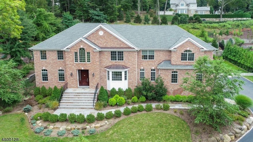 Spectacular brick-front center hall colonial of perfection: set on 0.69 acres of beautifully landscaped property at the heart of Deerfield section. Home is only 10 years old, features high ceilings, open floor plan, 3 car attached garages, two sets of stairs, and more.  From the dramatic entrance foyer, you are welcomed into this sophisticated home featuring crown moldings, exquisite mill work & gorgeous hardwood floors. This home has an ideal open floor plan perfect for entertaining. Gorgeous gourmet eat-in kitchen w/ state-of-the-art appliances, Wolf double oven & cook top, totally open to family room w/ wood-burning fireplace & soaring ceilings.  First floor features an in-law suite for an easy living. Second floor has 4 bedrooms, 3 full baths, backstairs, laundry room and a great room.  Primary suite w/ 2 walk-in "California" closets, spa-like master bath.