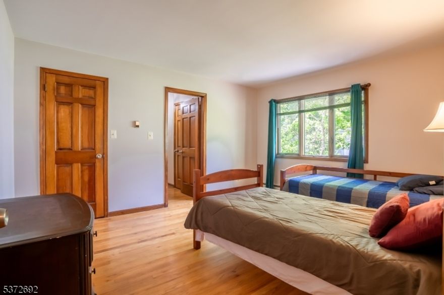 Rare rental offering over 4,500 sq ft of single-level living in Parsippany-Troy Hills! This 5-bed, 3-bath ranch features an open layout with hardwood floors, a formal dining area, and an oversized kitchen with ample cabinetry, prep space, and in-kitchen laundry for added convenience.The spacious primary suite includes a walk-in closet, spa-style bath, and its own fireplace, creating a cozy retreat. Enjoy a patio and plenty of parking. Located in a quiet neighborhood with top-rated schools and easy access to Rt 46, I-80, I-287 & NJ Transit.