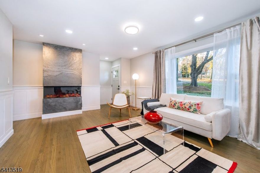 Don't miss this FULLY RENOVATED 4-Bed 2 Full BA Ranch featuring 2 Living Levels on a .69 ac. lot, located on a Cul-de-Sac in one of Succasunna's best neighborhoods! This home was professionally renovated with designer-picked upscale fixtures & finishes! The home features new roof/gutters, all new double-pane windows, new Mitsubishi mini-split Heating and Cooling system, fully renovated Kitchen and 2 Baths, 200 amp Elec. Panel, new ext. & int. doors, new LVP floors downstairs & refinished H/W floors upstairs, new lighting, new water heater/appliances, new Deck and Patio. The Main Level features a Liv. Rm w/Dining Area with an elec. F/P, an Eat-In Kitchen with granite counters & stainless appliances, 3 Bedrooms and a Bath. The Ground Level offers 2 (!) Walkouts and features a Rec. Rm/Fam Rm with a Fireplace and an 8' sliding Gl. Door for a direct access to the peaceful Backyard and a new Patio. Adjacent is a huge Primary Bedroom Suite with a Kitchenette and Breakfast Area, Laundry Closet with stacked W/D, en-suite Full Bath and Walk-In Closet. The newly-added Primary BR Suite is fully insulated and offers direct Gr. Level access to Backyard (a possible In-Law Suite). A roomy 1-car Garage is drywalled and insulated and offers many uses beyond storage. Rear yard, backing the woods, offers an incredible privacy.  A Cul-de-Sac location, professional renovation, Ground Level with 2 Walkouts w/ a possible In-Law Suite, and an amazing tranquil setting, make this home truly stand out!