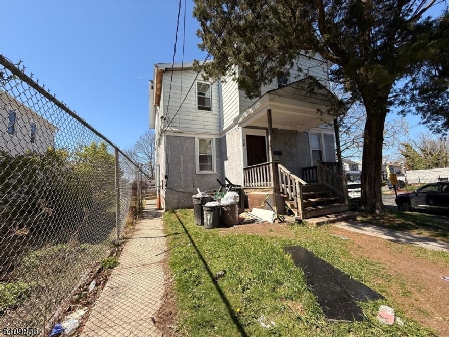 Legal 3-family home with separate utilities. The property features 4 bedrooms and 4 bathrooms, situated on an extra-large lot with ample parking. Includes a full basement and private yard. Located in a prime area close to schools, restaurants, shopping, and NYC transportation.