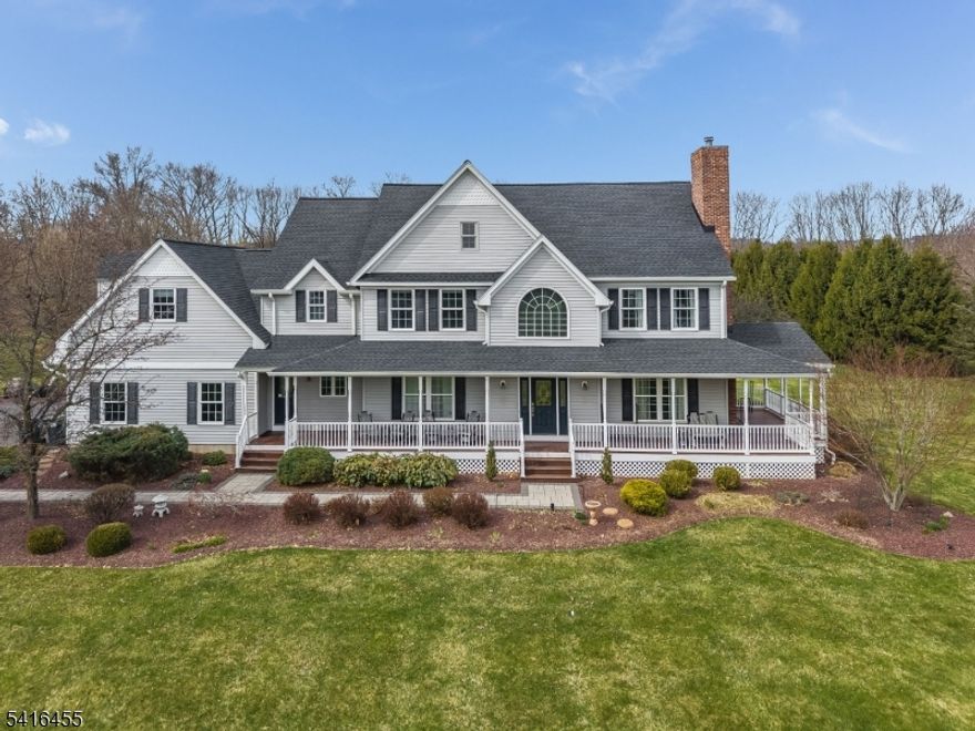 WELCOME HOME to this beautiful and spacious Colonial home located in the Dove's Landing section of Readington Township.  Features include a Wrap Around Mahogany Front Porch, Roomy Kitchen with an Island and newly installed Quartz Counters, Family Room w/ Amazing Floor to Ceiling Fireplace, Office w/ French Doors, Formal Living Room & Dining Room plus 1st Level Full Bath.  Second Level offers the Primary Bedroom with 2 professionally finished closets, a Huge Bath w/ Jetted Tub and Marble Flooring.  This level also includes 3 additional Bedrooms, Full Main Bath PLUS a Huge Finished Bonus Room.  Enjoy the view of all 2.18 acres while on your Deck or from the Patio surrounding a lovely landscaped InGround Gunite Poo!. Other Features of this beautiful home include Hardwood Flooring throughout 1st level, Full Basement & 3 Car Garage w/ Epoxy Floor Plus 3 new Garage Doors.  20 x 12 Storage Shed. Take in the rural beauty of Hunterdon County while remaining convenient for shopping and commuting.  Readington Twp School System/Hunterdon Central Regional High School. .