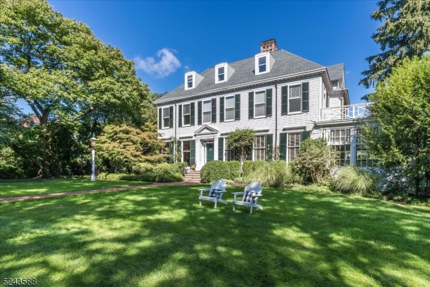 Welcome to your "country" house, nestled on over an acre of property just 15 miles from NYC and 4 blocks from Montclair's trendy downtown, bursting with life and culture. Spend your days amid the lush sprawling landscape of this unique home, a delightful fusion of modern comfort and historic charm. The captivating entry sets the tone for the elegance and serenity within. The spacious living areas are bathed in natural light, with large floor to ceiling windows that allow for a seamless connection between the indoors and out and create a sense of ease and warmth. Countless built-ins adorn the familyroom and 1st fl office. The heart of the home is a gourmet kitchen that combines the charm of the English countryside with the convenience of modern functionality. Stone countertops, a large center island and ample cabinets provide a ideal blend of aesthetics and practicality. A 6-burner Wolf range, SubZero refrigerator and high-end appliances cater to the demands of today's chef, while an ingeniously designed cellar will suit the wine connoisseur. This expansive home offers 7 bedrooms (5 w/ensuite baths), including a tranquil primary ensuite with separate dressing area. Now, step outside, where the magic truly comes to life. The porch, patio, and heated gunnite pool offer the perfect setting for your most cherished gatherings. All this on 1.17 acres PLUS a 3 car garage with a lovely income producing 2-bedroom carriage house apartment above. Your wait is over.