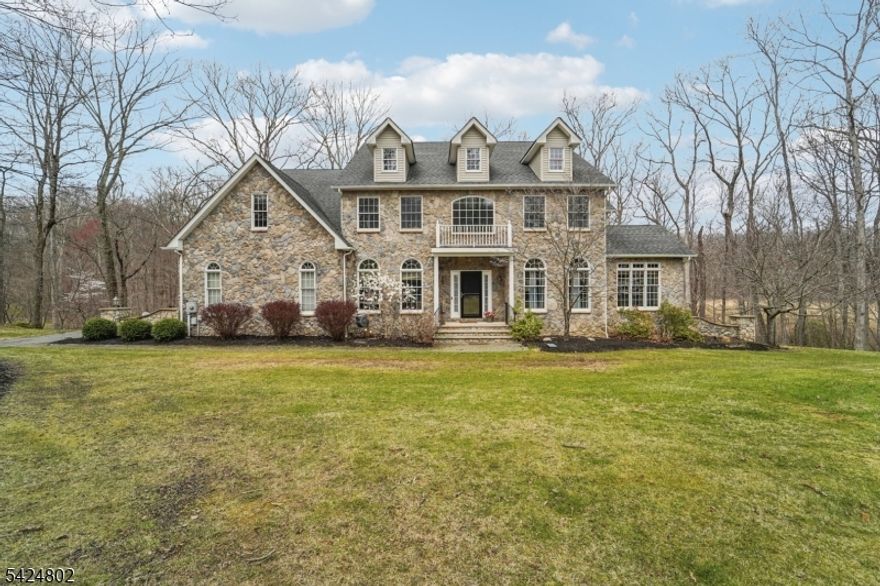 Welcome to this beautifully maintained Center Hall Colonial, built in 2004 and set in the scenic Glen View Forest community, featuring a striking stone front and an expansive 4-car garage; inside, this 10-room home offers 4 bedrooms and 3.1 bathrooms with hardwood floors throughout much of the space, a spacious primary suite with a private sitting room and large primary bath, and a well-appointed kitchen with granite countertops, a center island with breakfast bar, and ample room for cooking and gathering, plus a wood deck just off the kitchen ideal for outdoor dining, and a large walkout basement ready to be finished to suit your needs, all complemented by a functional layout perfect for everyday living and entertaining, while conveniently located near local amenities, major roadways, and outdoor recreation.