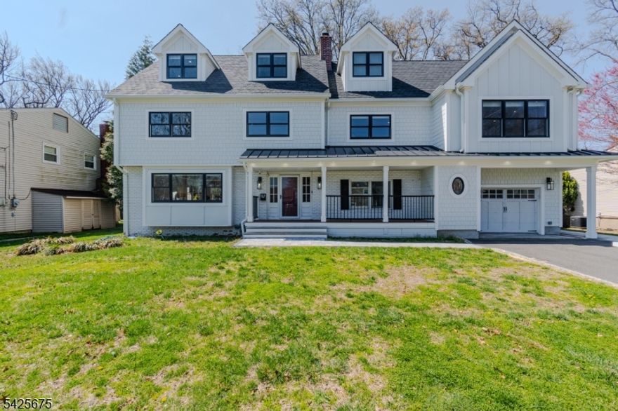 Welcome to 18 Woodside Road, a completely reimagined and fully renovated colonial completed in 2025, offering over 4,000 square feet of thoughtfully designed living space in one of Springfield's most desirable neighborhoods. Situated on a quiet cul-de-sac in the sought-after Woodside section, this home combines timeless architecture with modern luxury and exceptional craftsmanship.This expansive 6-bedroom residence features 5.5 beautifully appointed baths and a highly functional layout designed for today's lifestyle, including two private home offices ideal for remote work or flexible living. Every inch of the home has been curated with high-end designer finishes, from the stunning quartzite kitchen countertops to the elegant marble-appointed bathrooms, all brought together with a cohesive, professionally designed interior aesthetic.The finished basement provides additional living and entertaining space, perfect for a media room, gym, or guest suite. Set on a level lot along a picturesque, tree-lined street, the property offers both privacy and a serene suburban feel while remaining close to major transportation, shopping, and top-rated schools.A rare opportunity to own a turnkey, luxury home in one of Springfield's premier locations.