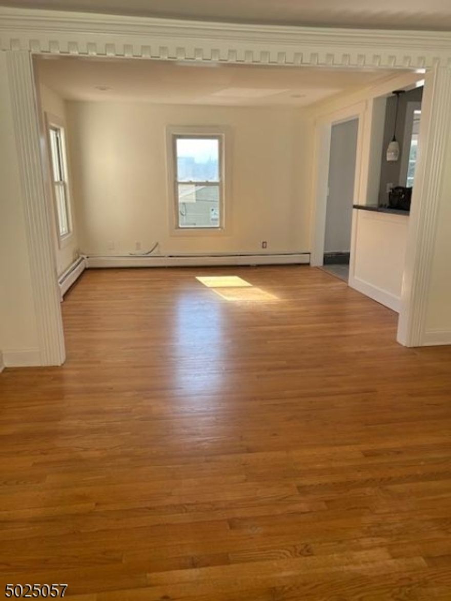 Welcome home to this beautifully renovated and modernized 2-Bedroom, 1-Bath Apartment located just a short walk from the Morristown Train Station (direct service to NYC), Shops vibrant restaurants, cafes, boutiques and nightlife. This spacious Unit features a Brand new HVAC System for year round comfort. Modern stainless steel appliances and sleek finishes in the Kitchen.  Gleaming hardwood floors throughout.  Updated Bathroom with contemporary design.  Bright open living spaces. Enjoy the convenience of living in the heart of Morristown, where commuting, dining, and shopping are all right at your door step. Newly renovated Bath with new tub, new walk in Shower, new sink and flooring.  Newly renovated Kitchen with new cabinets, sink, counter tops, Stove, Refrigerator & dishwasher. Easy access to major highways, (Rt. 287, Rt.10, Rt. 46 & Rt. 24).   2 Parking Spaces come with the apartment. New carpeted stairs to 2nd floor and a new AC Unit on the 2nd floor and on the 1st floor.  Don't miss the opportunity to make this modern gem your next home.