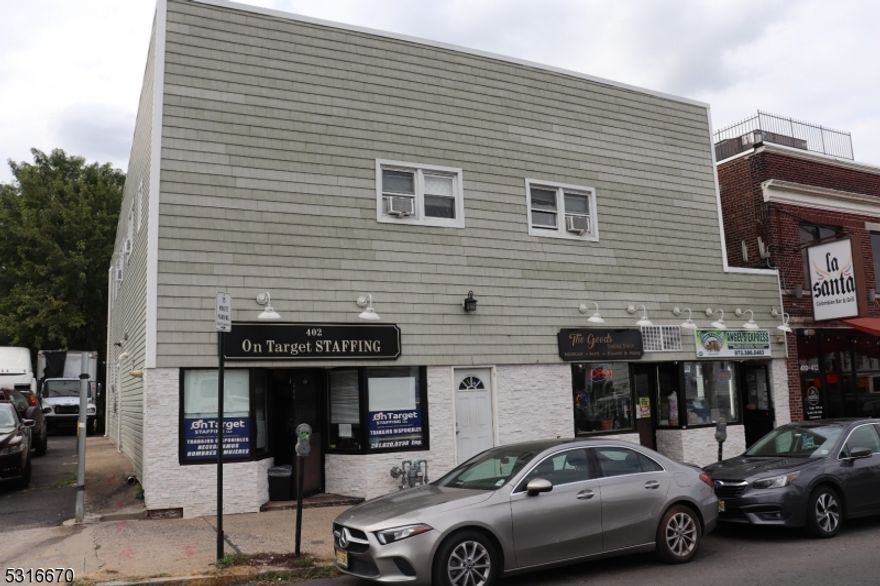 Two story building features a total of 9 units including 3 one-bedroom, 3 two-bedroom and 3 retail stores fronts. New installs include two water tanks (75 and 80 gallon), new windows and doors, new tile floors, bathtubs, vanities, kitchen cabinets, stoves and baseboard heaters in all apartments. Units are all separately metered, tenants pay own heat and electric, owner pays hot/cold water. Property is perfectly situated just steps from NYC transportation, shopping, restaurants and very easy access to Garden State Parkway North and South. The entire building has undergone a complete renovation including brand new roof, siding, stone, complete renovation of apartments and common areas. 6.3% cap rate