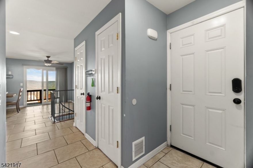 Welcome to resort style living with breathtaking mountain sunset views.   This 2 bedroom ,2 bath condo offers the perfect blend of comfort, convenience and scenic surroundings.   Featuring a large updated kitchen with granite countertops and shaker cabinets. Enjoy views from two private outdoor spaces, perfect for relaxing or entertaining.    Minutes from Minerals resort and spa, Mountain Creek and Crystal Springs.