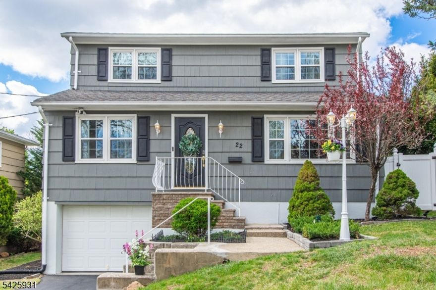 Immaculate Colonial updated to perfection, this stunning home is sure to impress. Offering 3 bedrooms, 2.5 baths, & 1-car garage w-ample driveway parking, this home is ideally situated on a desirable street across from Everett Park in the sought-after Verona. A spacious entry foyer welcomes you into a thoughtfully designed interior featuring an open concept floor plan, gleaming hardwood flrs & generously sized rooms, ideal for entertaining.The updated eat-in kitchen is a highlight, featuring quartz counters, stainless steel appliances, a built-in microwave, breakfast bar seating, & butler's pantry. Renovated baths add modern appeal. The finished LL offers additional living space w-full bath, laundry, rec area, office space, walk-in closet, & and walk-out access. The upper level includes 3 bedrooms served by an updated full bath. The primary bedroom is spacious & includes a walk-in closet.Glass sliders lead to a deck overlooking a fenced flat yard w-lush lawn & an oversized shed, perfect for relaxing or entertaining. Pride of ownership is evident throughout. Prime location 2-minute walk to direct NYC bus transportation, w-easy access to major highways, parks, restaurants, shopping, & convenient proximity to the Montclair train station for an easy NYC commute. Verona is known for its top-rated schools, strong sense of community, & beautiful parks. A rare opportunity to own a move-in-ready home offering style, comfort, & convenience in one of Essex County's most desirable towns.