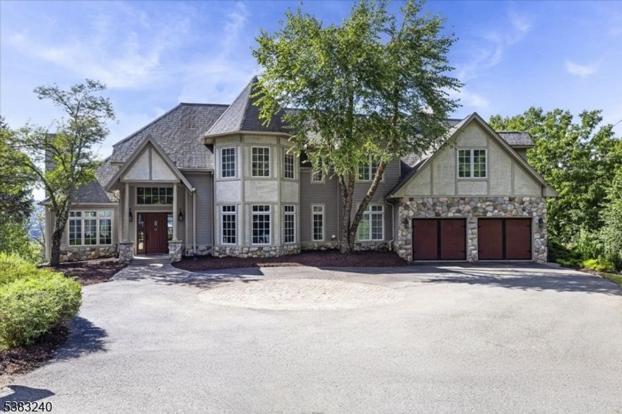 Tucked away at the end of a serene cul-de-sac in the coveted Lake Mohawk community, this stunning Colonial offers a rare blend of complete privacy, architectural intrigue, and a sought-after lakeside lifestyle. With over 4,450 sq ft of refined living space, 5 bedrooms, 4.5 baths, and an attached garage, the home boasts sweeping views of the water and mountains. Its unforgettable outdoor spaces include massive steel-supported balconies anchored by impressive 18-inch-deep wide-flange beams that hold an expansive deck unlike anything you've seen, creating the perfect setting for grand gatherings, quiet relaxation, and breathtaking sunsets. Appreciate the home's location in a truly magnificent school district, while lake enthusiasts can enjoy boating, fishing, swimming, and waterfront dining, with boat slips available for rent to keep your vessel right on the lake. If you're seeking a private retreat that delivers luxury  and tranquility all in one exceptional package, this is the home for you!