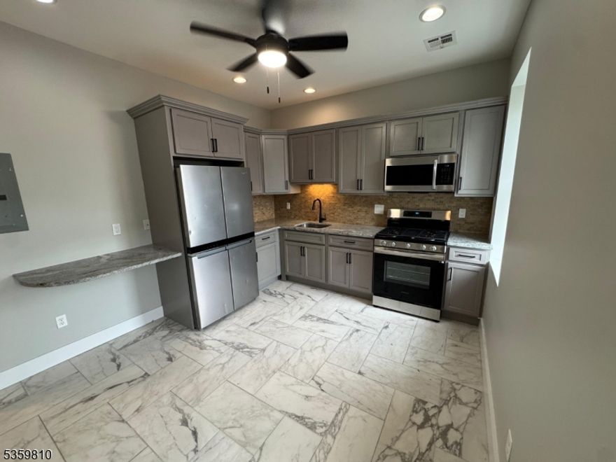 Chic 2-Bedroom Apartment in Prime Newark Location!Only 10 minutes from Newark Penn Station and directly across from a scenic park, this beautifully located apartment offers the perfect mix of comfort and city convenience. Inside, you'll find two bright and generously sized bedrooms with hardwood flooring, a modern kitchen, and a sleek, updated bathroom. Enjoy the ease of in-unit laundry and the added security of being just down the street from the local police station. Surrounded by transportation, shops, and dining this is urban living at its best.