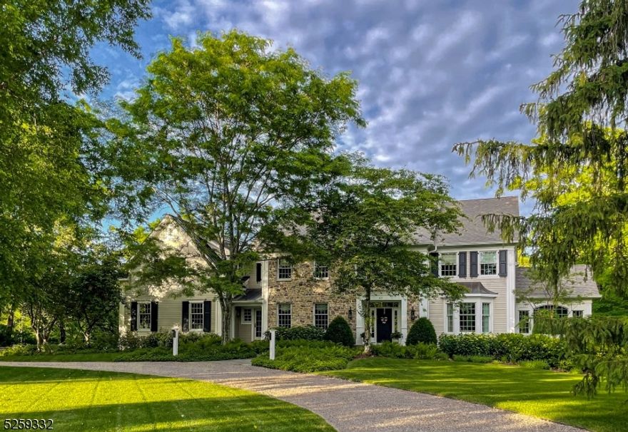 Meticulous, custom-designed Colonial with superb high-end finishes throughout. Cherry flooring throughout with custom moldings at every turn.  Inviting professional kitchen with adjacent screened porch. Luxurious primary bath recently renovated. Recently finished 5th bedroom suite complete with living area ideal for in-law.  Radiant heated floors in many areas of the home, including the finished lower level opening to the feature-rich outdoor kitchen with Lynx grill, Perlick refrigeration and soapstone counters over stainless cabinetry.  Lower level consists of media area, fully functioning kitchen, exercise room, half bath, and abundant storage. Heated garage, 20KW natural gas generator, new HVAC systems in 2023, and much more.  Privacy abounds.