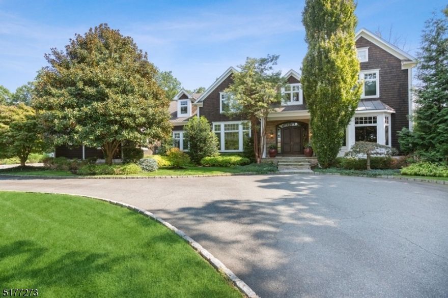 A one-of-a-kind custom estate awaits you in the prestigious Coventry section of Livingston. This elegant Colonial is built for entertaining and is situated on over 1 acre of magnificent grounds. The dramatic 2 story entry foyer with a sweeping staircase welcomes you into the home. Quality abounds with a recently updated chef's kitchen. Enjoy the sensational octagonal breakfast room with its soaring vaulted ceiling. Working from home will never be the same once you enter the stunning first-floor office, which includes exceptional millwork and is complimented by a wet bar and billiards room. The attention to detail is undeniable, from the oversized family room with coffered ceilings to the stunning dining room. Enjoy the luxurious primary suite, which includes a spa-like bathroom. The sprawling second level has three additional bedrooms, all with en suite bathrooms, and is completed with an additional office/bedroom. Upon descending to the lower level, you are welcomed into a themed 12 television sports bar, including a sensational, commercial quality wet bar with abundant refrigeration and seating, a game room, and an entertainment area. In addition, there is a spectacularly appointed gym and sauna. This home takes relaxation and enjoyment to new heights! Whether you are lounging by the breathtaking free-form pool and spa, spending time in the outdoor covered family room, or relaxing in front of the secluded backyard fireplace lounge, you will fall in love with this home.