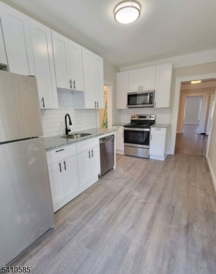 The historic row house has been fully renovated to highlight the original character while featuring all the modern amenities! This is a second floor apartment. Enjoy the large main bedroom with large windows and river views. The bonus room makes a perfect office or small bedroom! The eat in kitchen has loads of counter space and all new stainless appliances. The apartment has in unit laundry and a beautiful main bathroom. Enjoy in town living that and be just a short distance to dining and shopping. Vacant and ready for a new tenant.