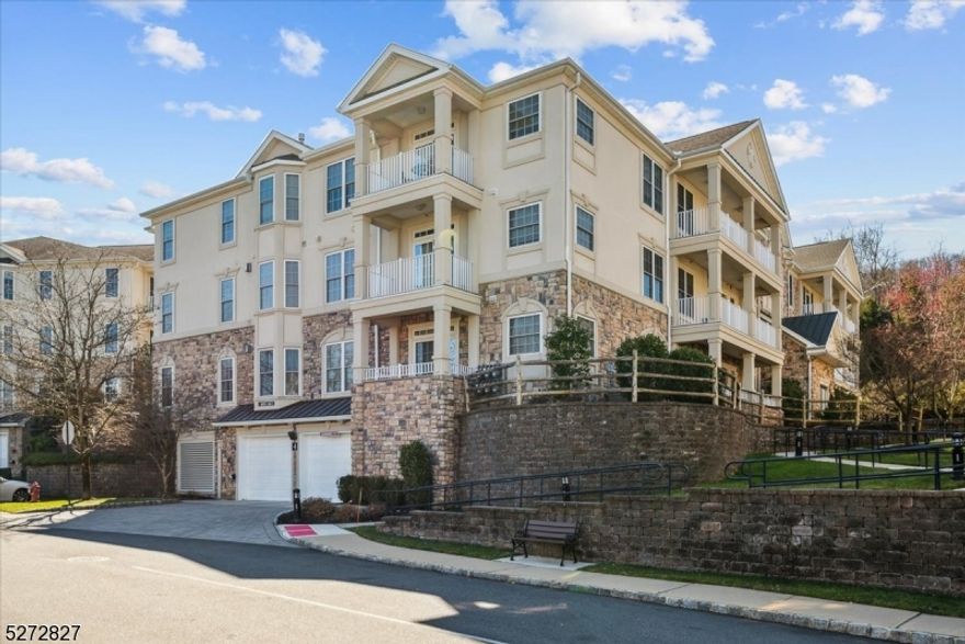 Easy One-Floor Living in a Tranquil Setting. Discover a low-maintenance lifestyle in this 2 bedroom, 2 bath, 1 Flex-Room Orchid model home in the desirable Four Seasons Community. Beautifully appointed unit with rich hardwood floors, crown molding, 9' ceilings & 2 balconies, with abundant space combining elegance with comfort. An inviting foyer with a convenient coat closet and in-unit laundry leads to a gracious formal living room with gas fireplace & balcony access. Columns frame the formal dining room, and the large eat-in kitchen features crisp white cabinetry, center island, dual ovens & a sunny breakfast nook. The primary bedroom has a private balcony with lovely views, plus a big walk-in closet & luxurious en-suite bath with soaking tub, stall shower & dual vanity. A second bedroom boasts a walk-in closet, in addition this unit also has an extra room that's ideal as an office or a family room. A full hall bath with tub/shower completes the interior. There's underground parking with one assigned space & an elevator to take you to or from your floor so no need to struggle with stairs! Garbage chutes are on each level plus additional covered parking is available. This amenity-filled community offers residents a clubhouse with fitness center, billiards room, outdoor pool, tennis courts, putting greens, electric charging station & more. Great location near shopping, restaurants, NYC transit, major roads & highways. Move-in ready, just waiting for you to unpack and enjoy!