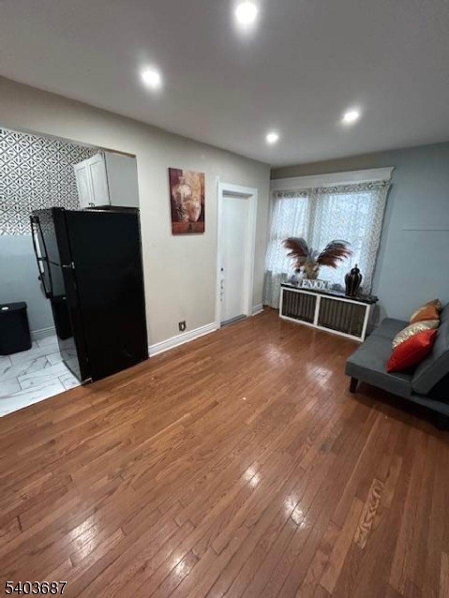 Bright, newly updated 1-bedroom apartment with full bath located on the 3rd floor in the desirable Weequahic section of Newark. This move-in-ready home features a renovated kitchen with a modern design and stylish appliances that add the perfect finishing touch. Conveniently located within walking distance to bus service to downtown Newark and less than 10 minutes from the South Orange train station with easy access to NYC. Off-the street parking. Schedule your showing today and make this apartment your new home!Application and tenant income verification required.