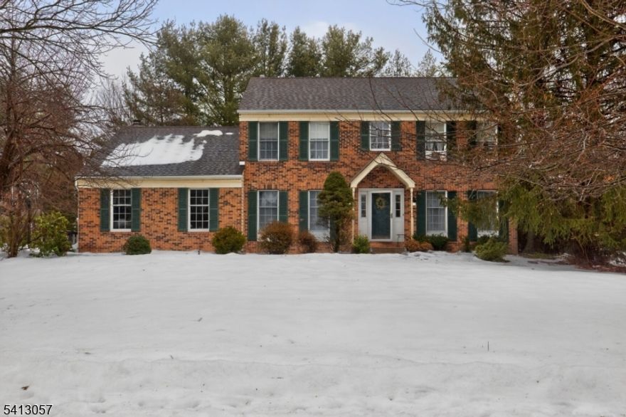 Stunning 4 bedroom Colonial set on a private .49 acre lot in Washington! This spacious and beautifully designed home offers the perfect blend of elegance, comfort, and functionality. The sun filled layout features a large eat in kitchen with abundant cabinetry and counter space. The large kitchen exits directly to an oversized deck, leading to the large backyard, surrounded by mature privacy landscaping, ideal for entertaining or quiet evenings at home. Just off the kitchen is a separate laundry room with convenient access to the attached 2 car garage. This property allows for ample storage and parking.In additional to a formal living room, a warm and inviting family room/den with fireplace & expansive windows creates the perfect gathering space. The main level also offers a private office or flex room near the entry,  and a separate dining room for elevated entertaining.Upstairs you will find 4 generously sized bedrooms including a spacious primary suite with a private bath retreat. A second full bath serves the additional bedrooms, along with a first floor powder room for guests. The fully finished basement provides exceptional bonus living space plus ample storage and utility area. A true move in ready Colonial offering space, privacy, and timeless appeal in one of Washingtons most desirable settings. This property will not last long!