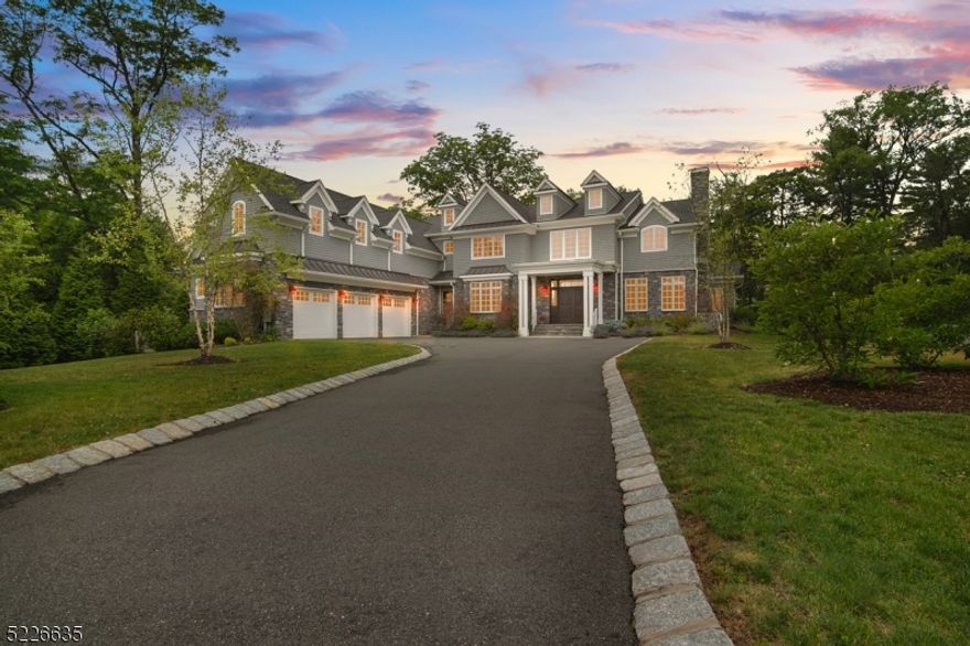 This is your Dream Home! 10,000 sq ft Center Hall Colonial built in 2018 by award winning Millennium Builders is ideally located on totally level 1.02 acre lot on cul de sac in highly rated Deerfield Elementary School District. 7 bedrooms - each w/ en-suite bath, 8.2 baths, office, library, & movie theater w/ 160" screen. Custom mahogany front door opens into a grand 2-story entrance hall w/ majestic staircase. Elegant dining rm w/ custom wainscoting. Butler's pantry, stunning eat-in chef's kitchen w/ SubZero, Wolf, & Miele appliances, 2 dishwashers, electric & gas ovens, quartz counter & waterfall marble island totally open to incredible family room w/ gas fireplace & coffered ceilings. Living Room features gas fireplace. Double doors lead to cozy covered stone porch wired for TV/stereo. Gracious 1st floor in-law suite w/ en-suite bath & 2 powder rooms. Easy 1st floor access to oversized 3 car garage w/ 12' ceilings can accommodate 6 cars w/ lifts. Luxurious primary suite w/ spa-like primary bath, heated floors, soaking tub & shower, huge custom WIC & sitting room. 4 more en suite bedrooms & laundry on 2nd level. Beautifully finished lower level w/ 10' ceilings, large wet bar, movie theater w/160" screen, exercise room, rec room, large bedroom suite. Large level private backyard w/ 2 stone patios. Whole house 32KW generator. Additional structure w/ heat & electric used as workshop can be home office or art studio. Just 1 mile from downtown & midtown direct train line to NYC!