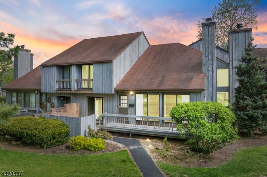 Welcome to this beautifully maintained 2-bedroom, 2.5-bath home with a finished basement and 1-car garage. The open-concept layout features recessed lighting throughout and a sun-filled two-story living room with hardwood floors and a fireplace that flows seamlessly into the dining area and kitchen. The kitchen offers maple cabinets, granite countertops, a backsplash, and a built-in island. The first floor also includes a convenient laundry room and powder room. Upstairs, an open loft overlooks the living room, ideal for a home office or play area. The spacious primary suite features a private updated bathroom and sliding doors to a balcony, while an additional bedroom and full bathroom complete the second level. The finished basement provides flexible space for recreation, work, or a home gym. Additional highlights include a 2024 HVAC system and a garage equipped with a Tesla charger. Located in a highly rated school district with easy access to major highways, parks, shopping, and dining, this home truly has it all.