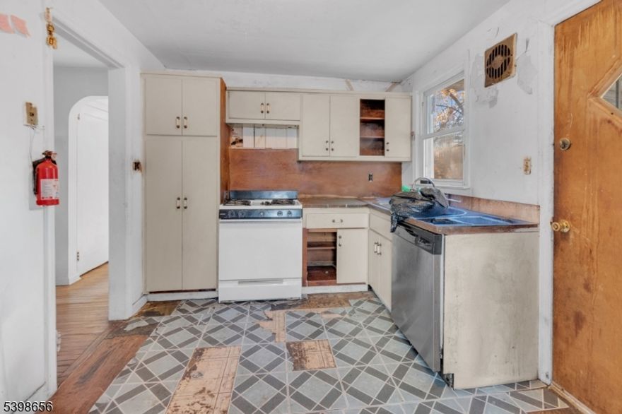 Unlock the potential in this rarely available two-family home located in one of Irvington?s most preferred and convenient neighborhoods. Just a short walk to a local park, schools, shops, and public transportation ? this property offers the perfect foundation for a high-value renovation.Featuring classic architectural character throughout, this older home is ready for a complete transformation. Whether you're an investor seeking strong rental returns or a homeowner looking to offset your mortgage with rental income, the layout and location make this an exceptional value-add opportunity. As Is Transaction.