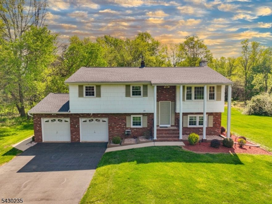 Welcome to this spacious and well-maintained bilevel home located in the highly sought-after Hillsborough School District! Offering great curb appeal, this home features 4 bedrooms with a potential 5th bedroom or office space, along with 2.5 baths, providing the flexibility and room you need. The generous primary suite features ample closet space and its own private full bath. Hardwood flooring is hidden beneath the upper-level carpeting, ready to be uncovered and enjoyed. The ground level offers a freshly painted living room complete with a cozy fireplace and sliding glass doors leading directly to the backyard and patio. A perfect setup for indoor/outdoor living and entertaining. Brand new carpeting has been installed throughout the ground level rooms, while the kitchen and ground floor half bath feature recently installed LVP flooring. Additional highlights include replacement windows throughout, newer roof (2022), newer water heater (2022), natural gas heat, central air conditioning, public water and sewer, and a 2-car garage with plenty of off-street parking. Property backs up to Green acres and is perfectly situated just minutes from shopping, dining, major roadways, Princeton, Somerville, and a short drive to the NYC Train. This home offers both convenience and comfort in an ideal location. Make your appointment today!