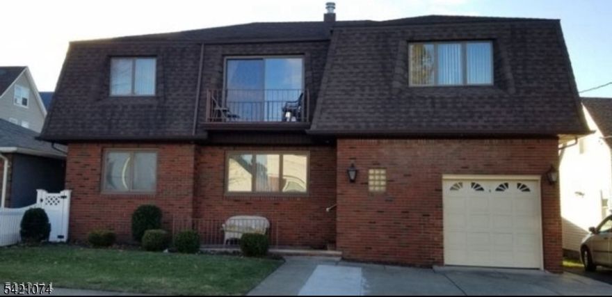 Renovated 2nd floor of 2-family home.  Primary with full bath, plus 2 more bedrooms, 2nd full bath.  Wood Floors, eat-in Kitchen, FDR, LR, w/artificial fireplace, 2 balconies, all lighting/fans, walk-up attic for storage. Garage use for laundry w/washer/dryer and storage.  Shared use of fenced in yard. Lawn and Snow removal shared with 1st floor tenant.  Water included.  All other utilities pd by tenant. NO SMOKING OF ANY KIND.  NO PETS. Assigned parking in front of garage.  Free street parking with town sticker. Lease application, proper ID, and credit report 650 and above, NTN.  CO/Smoke completed by Landlord, paid by tenant to City of Garfield, $60.  Unit will be totally painted, professionally cleaned, carpet cleaned, and cooktop replaced.