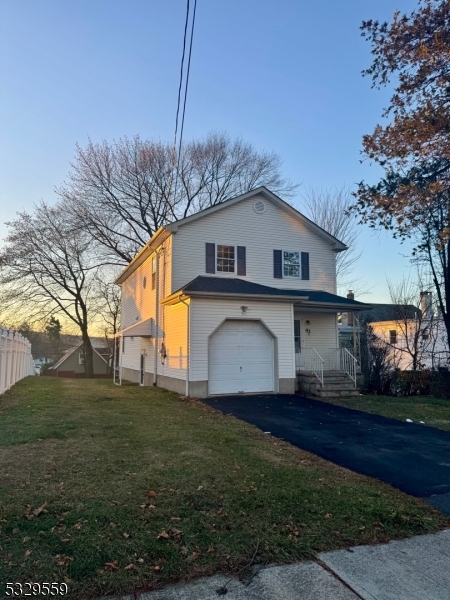 Totally renovated Colonial style home in Morris County's booming town of Dover New Jersey. Spacious open floor concept. Elegant hardwood floors throughout. Living room, large eat-in-kitchen with custom white kitchen cabinets with crown on top. Granite counter-tops. Modern black stainless steel appliances. Recessed LED lighting throughout. Very large bedrooms with multiple walk in closets. Beautifully designed bathrooms with decorative black & white tiles and contemporary vanities. Basement is a huge plus as it was built with an extra course of block foundation for 9 feet high ceilings and center beam for openness. Close to the heart of the downtown which offers restaurants & entertainment. Train station with a Mid-Town-Direct!