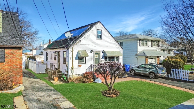 Welcome to this charming Cape Cod home located in the heart of highly desirable Linden! This move-in ready gem features 4 spacious bedrooms and 1 beautifully renovated bathroom. The recently upgraded kitchen boasts modern finishes, offering a stylish and functional space perfect for cooking and entertaining.The basement adds incredible versatility with two large storage rooms, ideal for keeping your home organized or transforming into a hobby space. The property's layout is both cozy and practical, with a warm Cape Cod aesthetic that feels like home the moment you step inside.Nestled in a sought-after neighborhood, this home offers convenience, character, and modern updates throughout. Don't miss your opportunity to own this turn-key beauty